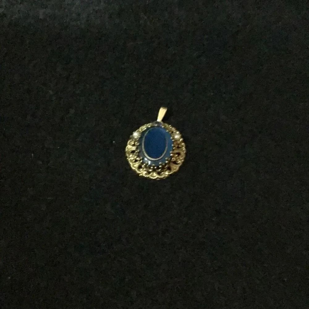 Vintage golden and blue stone pendant